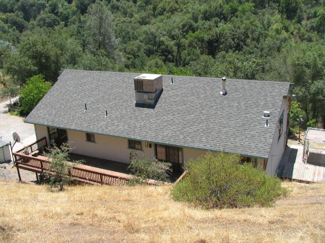 4 North side-back of house and deck.JPG, 76 kB
