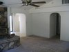 Living room facing hall and dining area.JPG